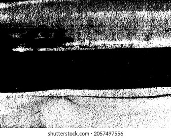 Grunge is black and white. Texture of black strokes on a white background. Abstract chaotic movements with a dry brush. Monochrome pattern of worn surface