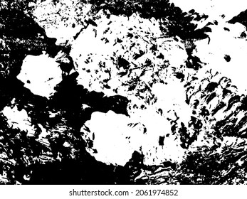 Grunge is black and white. Texture of black strokes on a white background. Abstract chaotic movements with a dry brush. Monochrome pattern of worn surface
