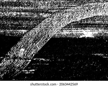 Grunge es blanco y negro. Textura de pinceladas negras sobre un fondo blanco. Resumen de movimientos caóticos con un cepillo seco. Patrón monocromo de superficie desgastada