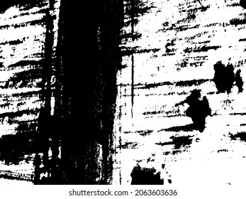Grunge is black and white. Texture of black strokes on a white background. Abstract chaotic movements with a dry brush. Monochrome pattern of worn surface