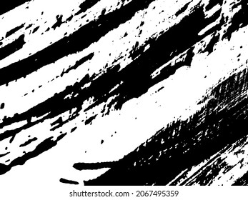 Grunge is black and white. Texture of black strokes on a white background. Abstract chaotic movements with a dry brush. Monochrome pattern of worn surface