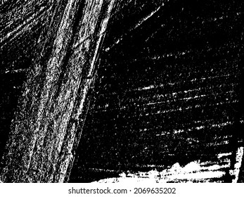 Grunge es blanco y negro. Textura de pinceladas negras sobre un fondo blanco. Resumen de movimientos caóticos con un cepillo seco. Patrón monocromo de superficie desgastada