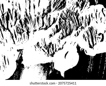 Grunge is black and white. Texture of black strokes on a white background. Abstract chaotic movements with a dry brush. Monochrome pattern of worn surface