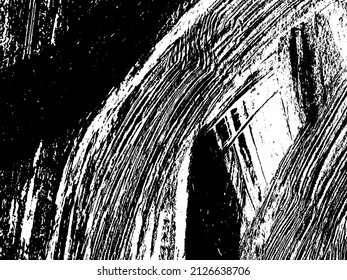 Grunge is black and white. Texture of black strokes on a white background. Abstract chaotic movements with a dry brush. Monochrome pattern of worn surface