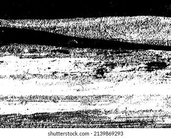 Grunge is black and white. Texture of black strokes on a white background. Abstract chaotic movements with a dry brush. Monochrome pattern of worn surface