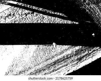 Grunge is black and white. Texture of black strokes on a white background. Abstract chaotic movements with a dry brush. Monochrome pattern of worn surface