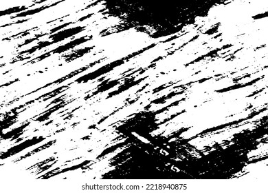 Grunge is black and white. Texture of black strokes on a white background. Abstract chaotic movements with a dry brush. Monochrome pattern of worn surface
