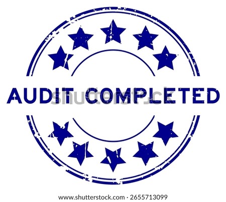 Grunge blue audit completed word round rubber seal stamp on white background
