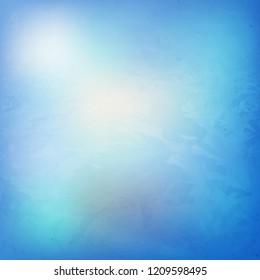 Grunge blue background, vintage background grunge texture. cool plain wall or paper. Abstract design Blue background. Frosty patterns on a blue background of the winter sky.Vector. Eps10.