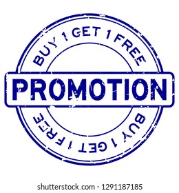 Grunge blue promotion buy 1 free 1 round rubber seal stamp on white background