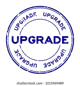 Grunge blue upgrade wording round rubber seal stamp on white background
