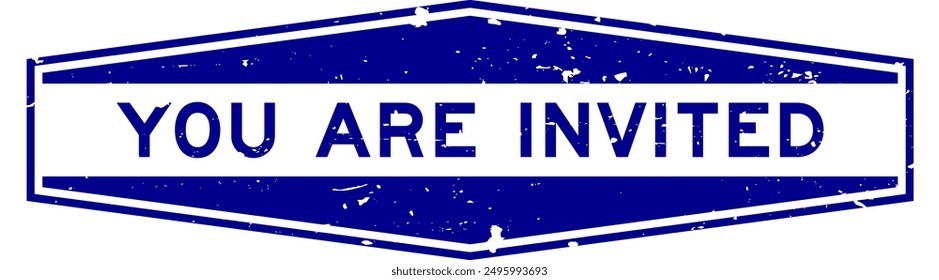 Grunge blue you are invited word hexagon rubber seal stamp on white background