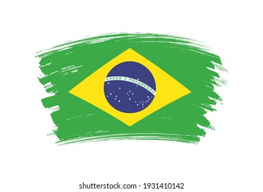 Agarra la bandera de Brasil. Bandera de pincel en Brasil.