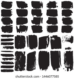 Grunge brush dry. Vector black spots on a white background