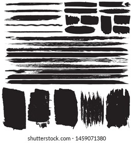 Grunge brush dry. Vector black spots on a white background