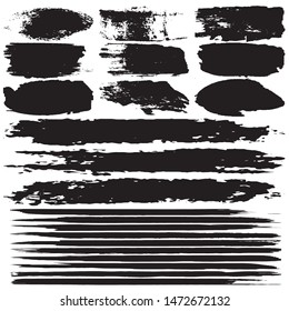 Grunge brush dry. Vector black spots on a white background