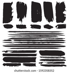Grunge brush dry. Vector black spots on a white background