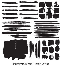 Grunge brush dry. Vector black spots on a white background