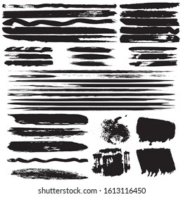 Grunge brush dry. Vector black spots on a white background