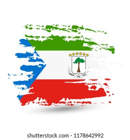 Grunge brush stroke with Equatorial Guinea national flag. Style watercolor drawing. Vector isolated on white background.