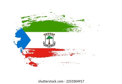 Grunge brush stroke flag of Equatorial Guinea with painted brush splatter effect on solid background