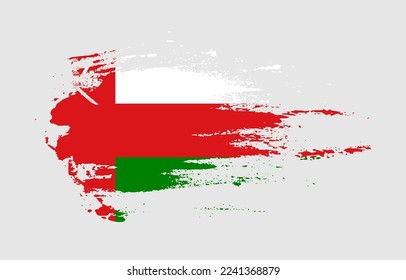 Grunge brush stroke flag of Oman with painted brush splatter effect on solid background