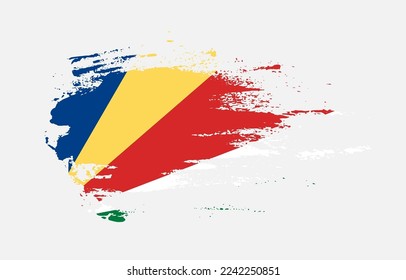 Grunge brush stroke flag of Seychelles with painted brush splatter effect on solid background