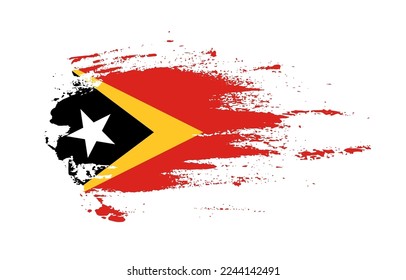 Grunge brush stroke flag of Timor Leste with painted brush splatter effect on solid background