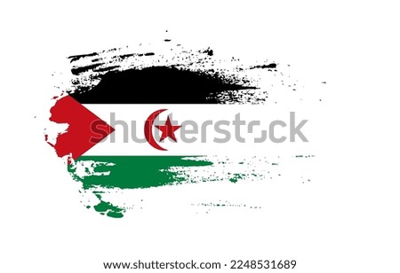 Grunge brush stroke flag of Western Sahara with painted brush splatter effect on solid background