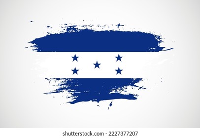 Grunge brush stroke with the national flag of Honduras on a white isolated background