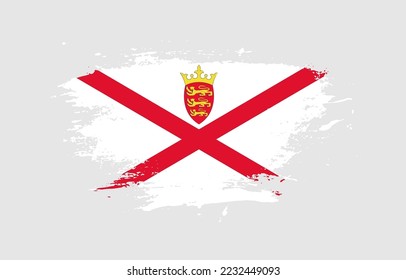 Grunge brush stroke with the national flag of Jersey on a white isolated background