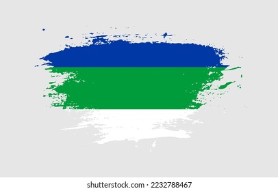 Grunge brush stroke with the national flag of Komi Republic on a white isolated background
