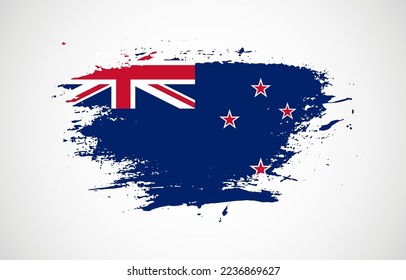 Grunge brush stroke with the national flag of New Zealand on a white isolated background