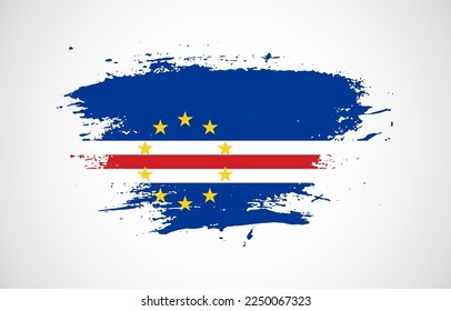 Grunge brush stroke with the national flag of Cape Verde on a white isolated background