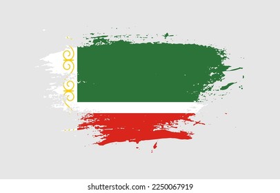 Barrage à brosse grunge avec le drapeau national de Tchétchénie sur fond blanc isolé