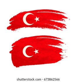 Grunge brush stroke with Turkey national flag isolated on white