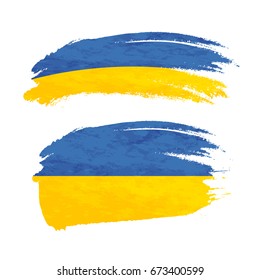 Grunge brush stroke with Ukraine national flag isolated on white