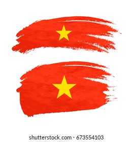 Grunge brush stroke with Vietnam national flag isolated on white
