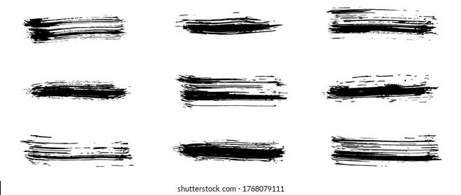 Grunge brush stroke.Grunge black brush strokes. Abstract textured strokes and prints thick black gouache paint isolated on a white background.