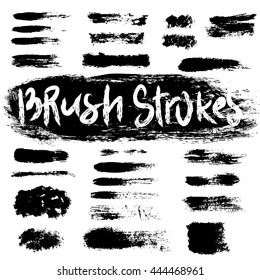 Grunge brush strokes set. Black hatches isolated on white background.