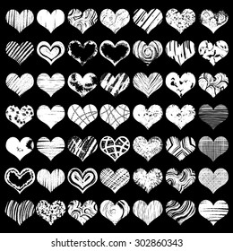 Grunge chalk hearts. Hand drawings and doodles, vector set.