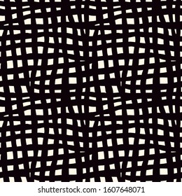 Grunge checkered seamless surface pattern. Crushed rough edge squares print. Black and white geometric motif. Freehand design. Chaotic wallpaper. Vector abstract modern background.