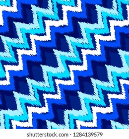 Grunge chevron pattern. Zigzag. Ethnic fabric design. Ikat. Boho. Fashion. Paint lines ornament. Ink strokes wallpaper. Abstract seamless texture.