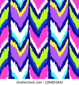 Grunge chevron pattern. Zigzag. Ethnic fabric design. Ikat. Boho. Fashion. Paint lines ornament. Ink strokes wallpaper. Abstract seamless texture.