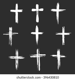 Grunge christian cross icons. White images on black background. Vector illustration