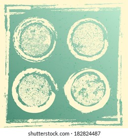 Grunge circles on green background 