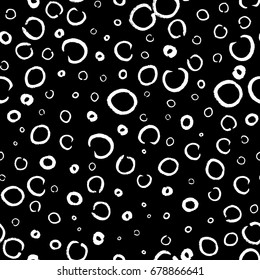 Grunge circles seamless pattern. Hand drawn round shapes background. Black white brush stroke texture. Geometric graphic design element for scrapbook, poster, flyer, wallpaper. Vector illustration