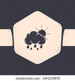 Grunge Cloud with rain and sun icon isolated on grey background. Rain cloud precipitation with rain drops. Monochrome vintage drawing. Vector Illustration Grunge Cloud with rain and sun icon isolated on grey background. Rain cloud precipitation with rain drops. Monochrome vintage drawing. Vector Illustration
