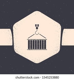 Grunge Container on crane icon isolated on grey background. Crane lifts a container with cargo. Monochrome vintage drawing. Vector Illustration
