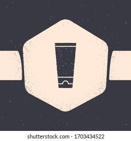 Grunge Cream or lotion cosmetic tube icon isolated on grey background. Body care products for men. Monochrome vintage drawing. Vector Illustration
